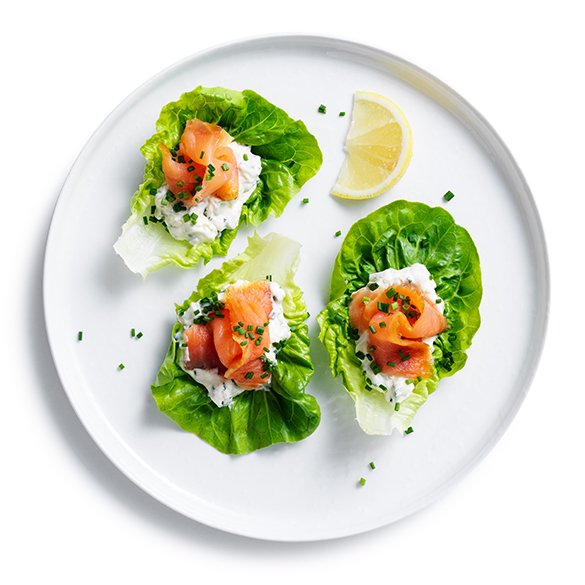 Smoked Salmon and horseradish cream little gem lettuce cups on white